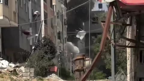See Israeli air strike destroy a residential tower in Gaza