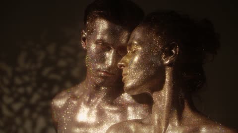 Couple covered in glitter