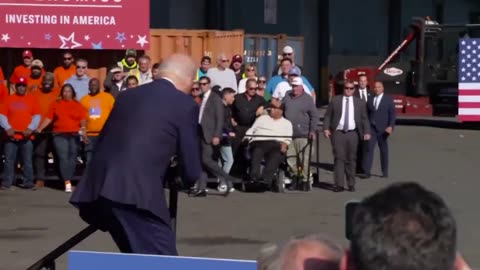 Biden almost wipes out as he takes the stage in Philadelphia