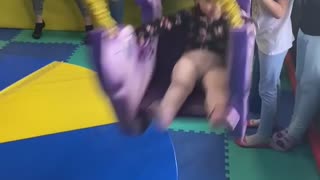 Girl Sent Flying by Swing to the Face