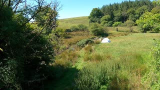 Drone footage. Dartmoor wildcamping paid campsite area.