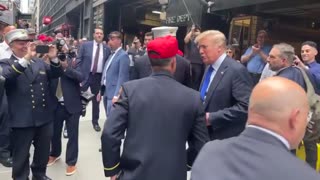 Donald Trump greeted by first responders at Ground Zero