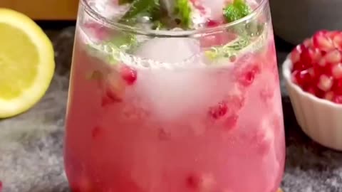 "Sip on Summer Bliss with the Sparkling Virgin Pomegranate Mojito!"