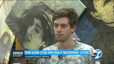 Spincer elden,man on Nirvana ablum cover as baby