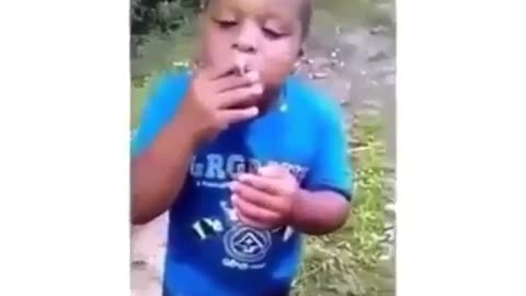A child smoking indian hemp😂😂😂😂😂