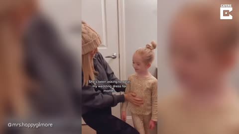 Adorable Little Girl Tries On Mum's Wedding Dress