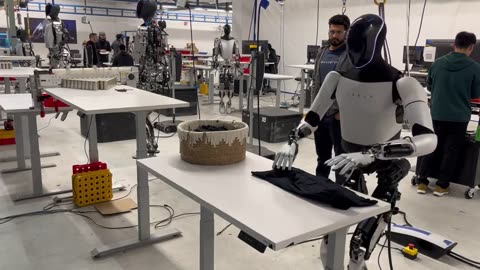 Tesla's Optimus robot is now able to fold shirts