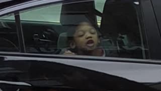Girl Licks Window and Makes Silly Faces