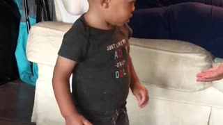 Adorable baby loves dancing