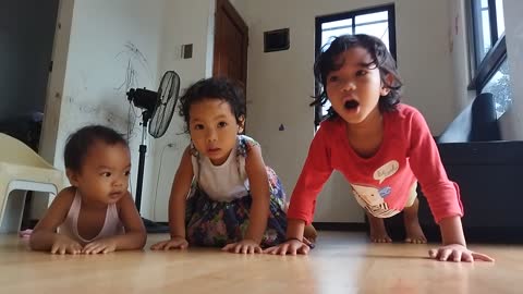Cute Little Kids with their Morning Exercise