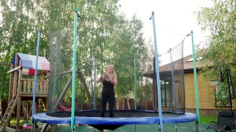 Woman jumping on a small trampoline