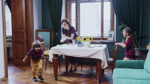 Boy Throw Flowers and Food in the Plate while Eating