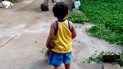 toddler helping family do the cleaning