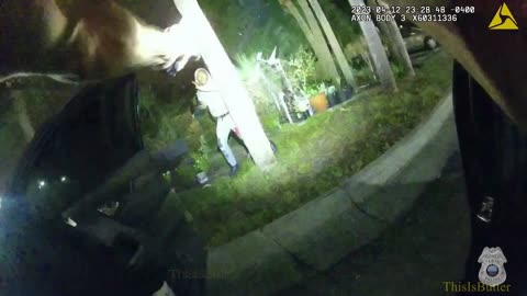 Tampa police release body cam of an officer shooting an armed suspect who was behind a tree