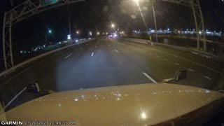 Man Runs Across Busy Highway Causing Truck To Swerve
