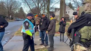 Several armed individuals show up at the protest Columbus