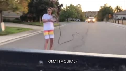 Young Man Skate Surfing Behind Truck Fail