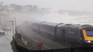 Dawlish train storm waves