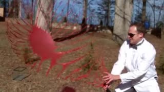 popping a balloon in slow motion