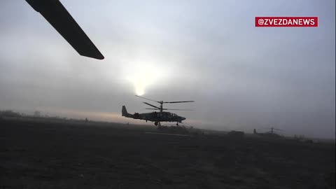 Ka-52 Alligator and Mi-35M helicopters at extremely low altitude.