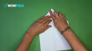 Playing in clouds - folding a paper airplane