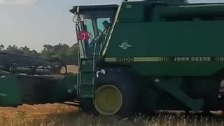 John Deere 9500 in the Wheat field