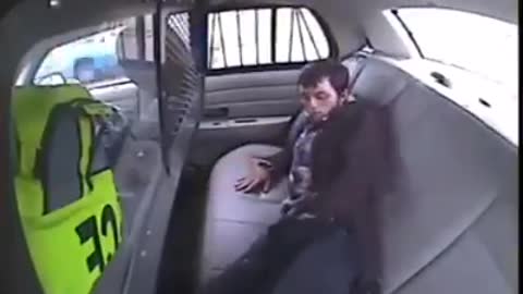 How not to escape from the back of a cop car