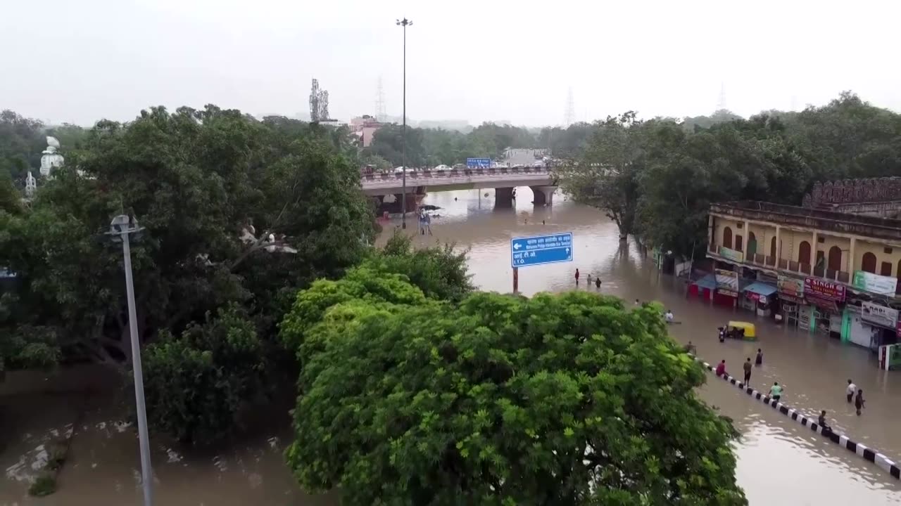 New Delhi races to open jammed flood gates