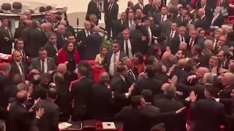 Fists Fly As Lawmakers Brawl In Turkish Parliament