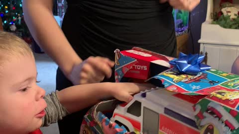 Baby Leo opening presents With his Bio family :)