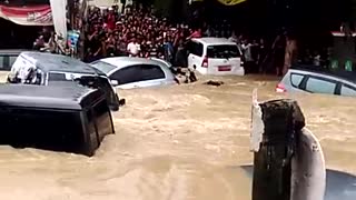 Cars Washed Away in Surprise Flooding