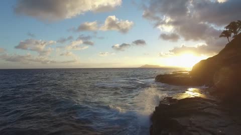 Ocean waves during sunset