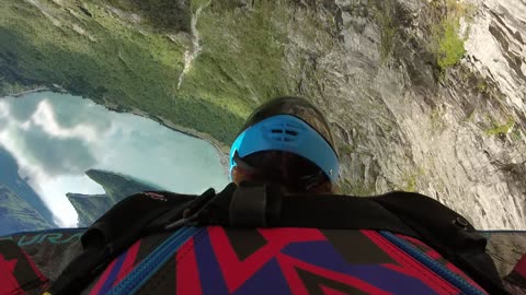Wingsuit Base Jumper Collects Some Branches on His Run