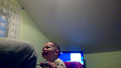 happy baby playing with Dad