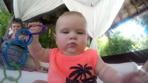 Baby eating a GoPro with an addictive laugh