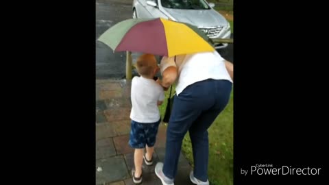 Little boy helping grandma to car