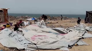 Displaced Palestinians set up camp in Deir al-Balah