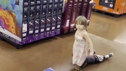 Sister Drags Cranky Brother Through Store