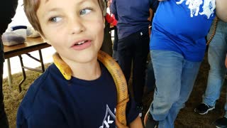 Little boy with snake