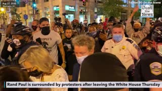 Rand Paul surrounded by protesters on Thursday night