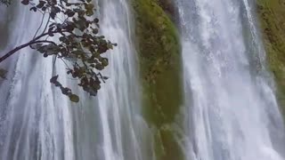 Guy Jumps into Waterfall