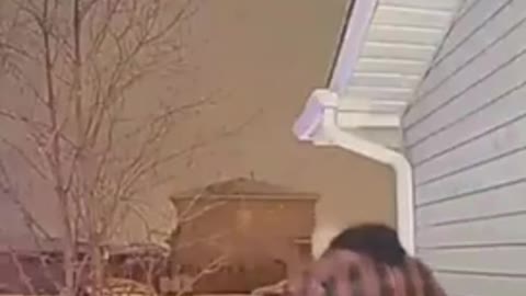 Front door security camera, husband slips down icy stairs on front porch