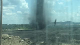 Dust Devil Creeps Across Coal Mine