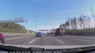 Runaway Tire Nearly Misses Car