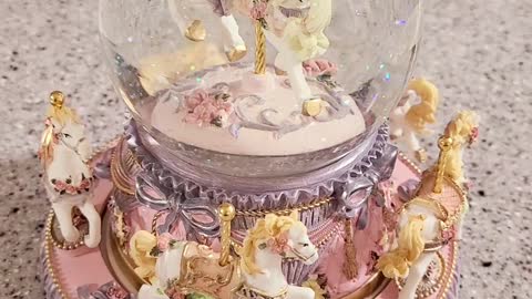 A pretty musicbox with a merry-go-round as the music plays