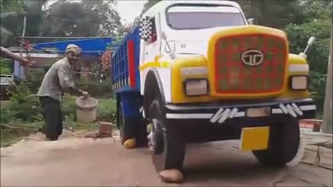 Truck falls back and driver.....?