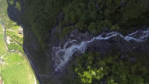 This Footage Of Speedflying Over A Waterfall Will Give You An Adrenaline Rush