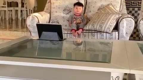 Baby see happy with cartoon