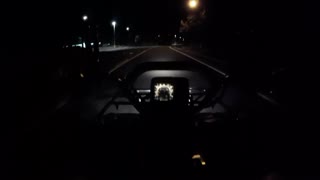 Cruising around the neighborhood in the dark with Suzuki King Quad