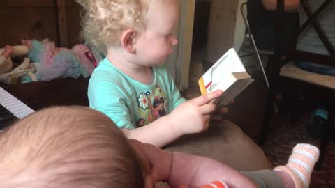 2 Year Old Big Sister Reads to 2 Month Old Brother